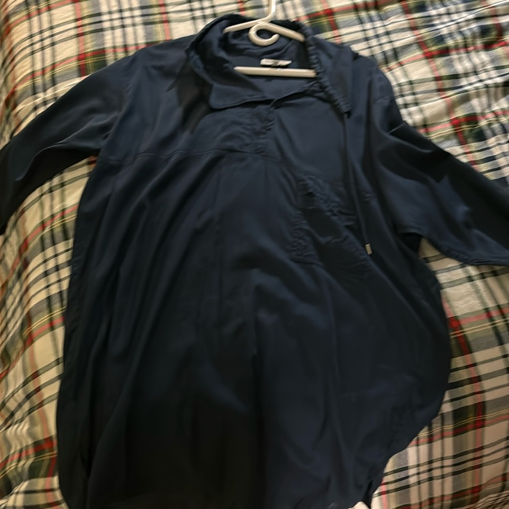 Beautiful Lacoste top size 40 oversized. Worn a couple times.